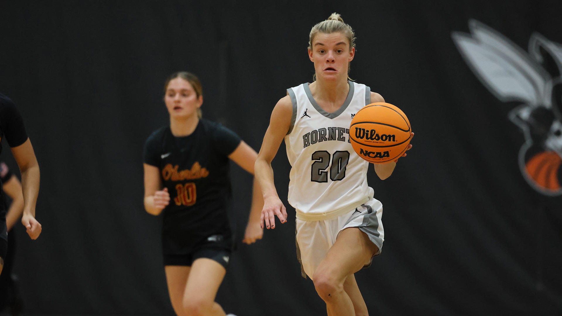 Ruby Hogan playing basketball