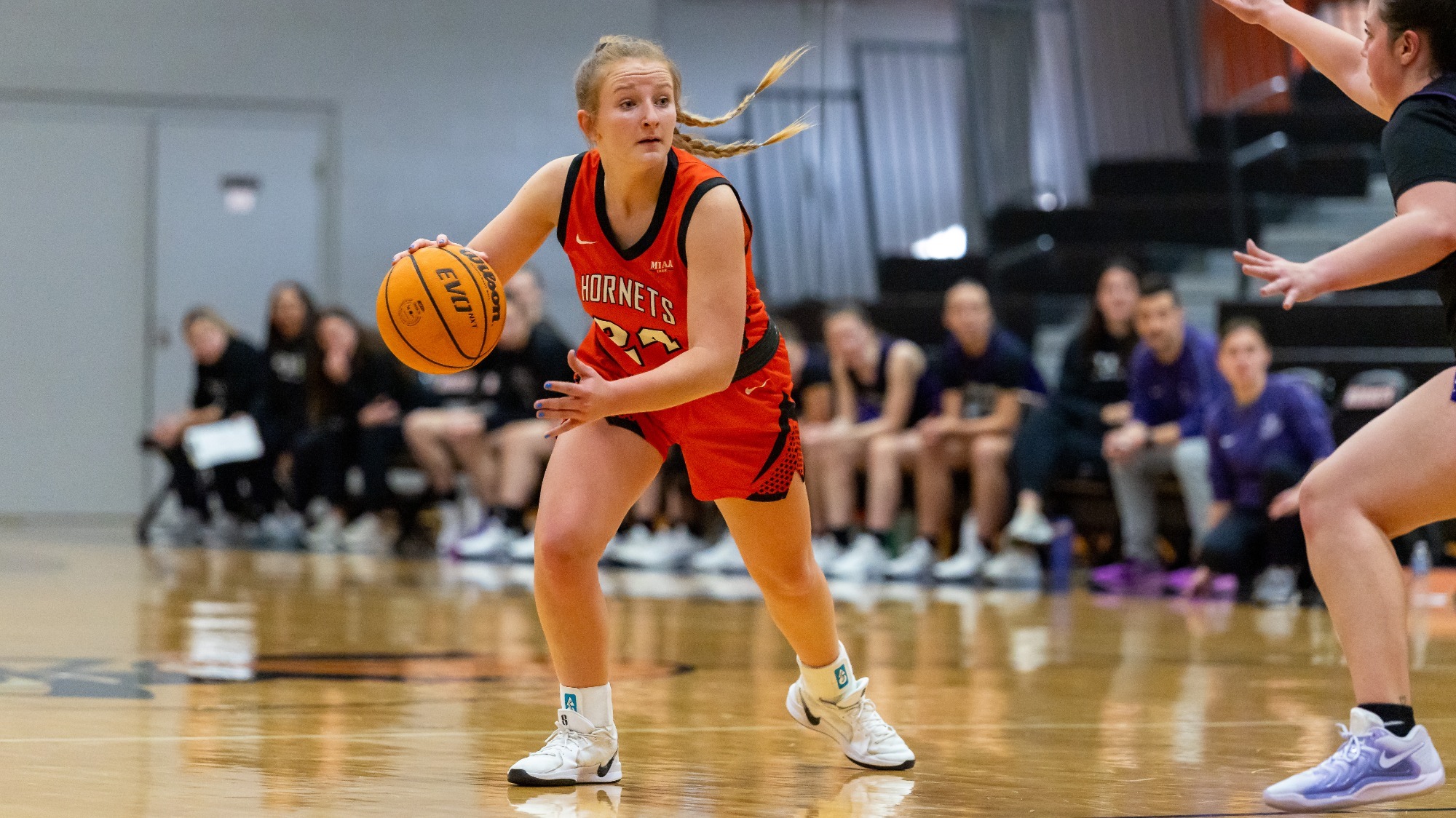 Taylor Dinda playing basketball