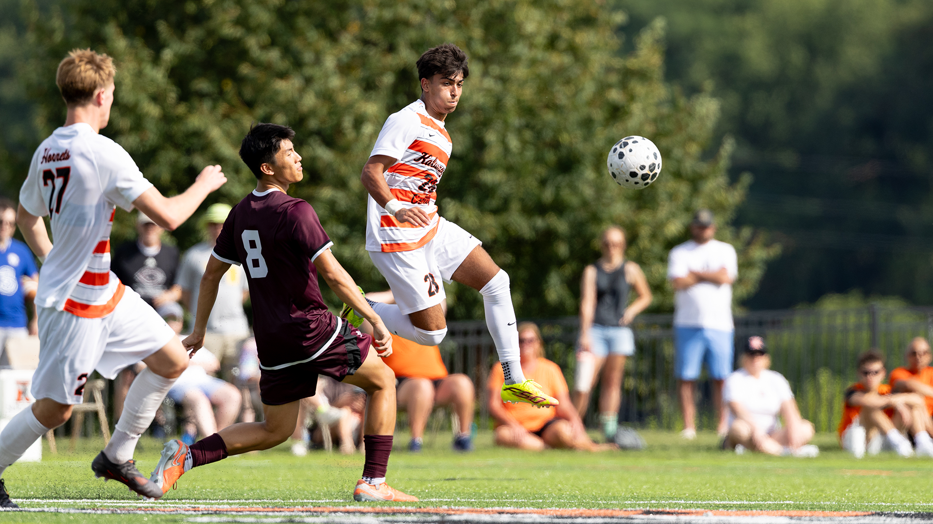 Dhrruv Naik playing soccer