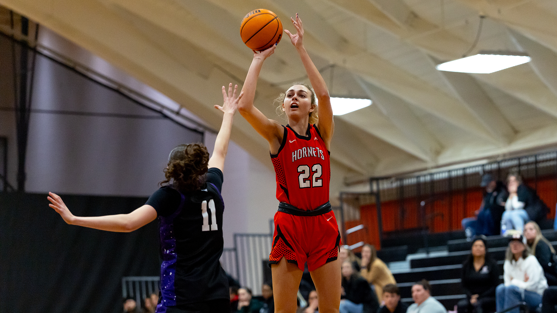 Lauren Vanderstelt playing basketball
