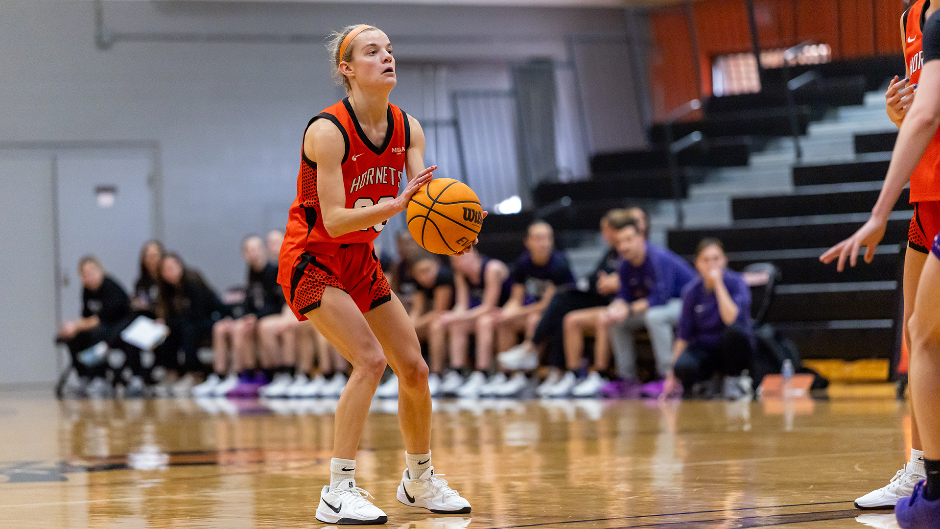 Ruby Hogan playing basketball