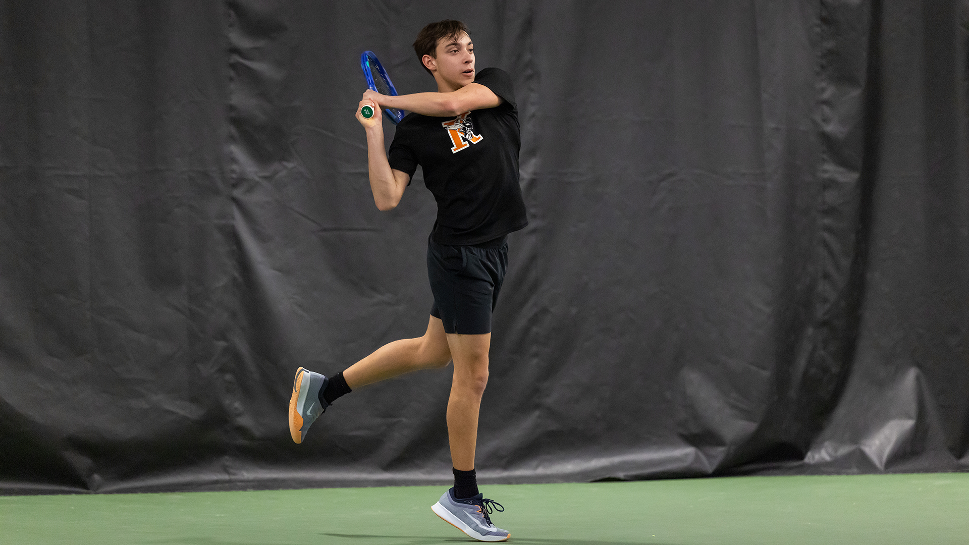 Sebastian Courtright playing tennis