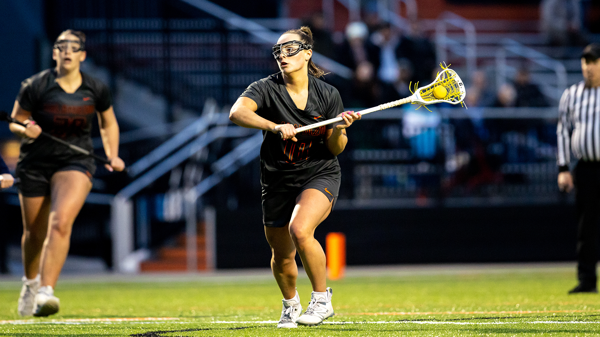 Ella Spooner playing lacrosse