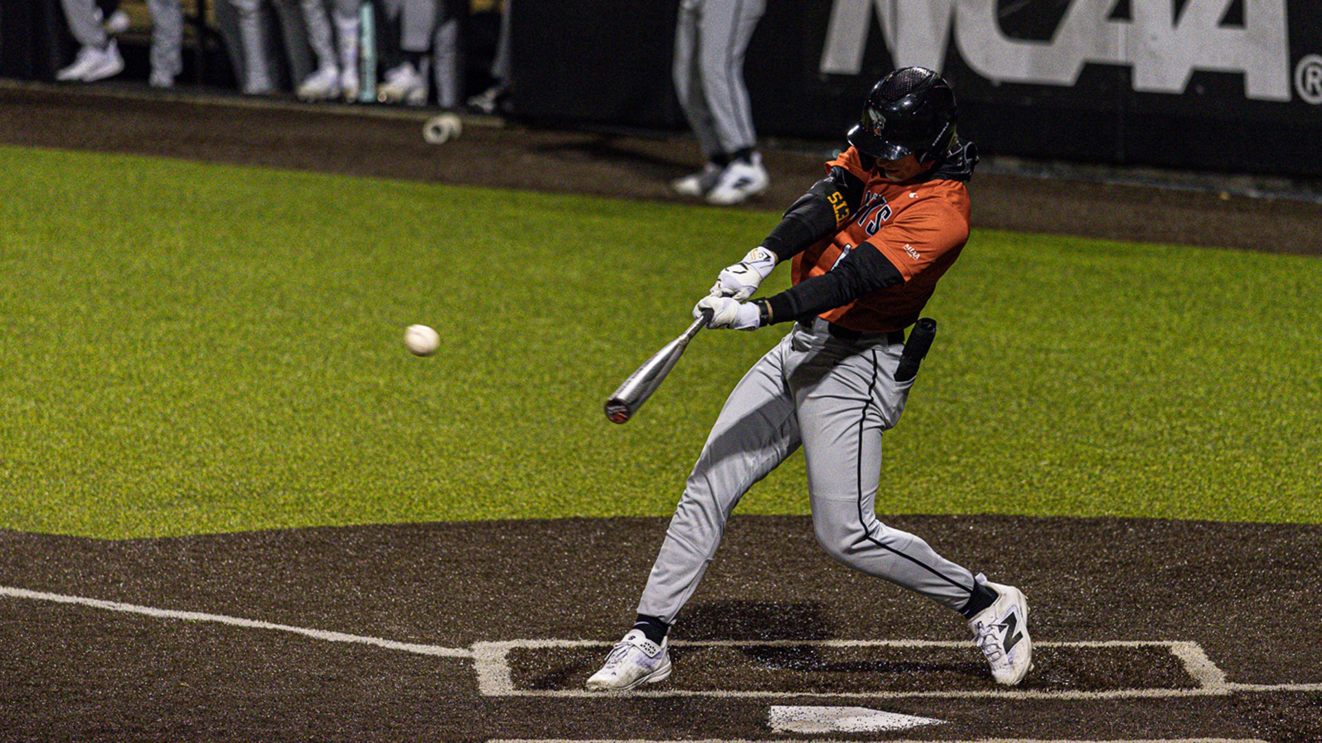 Alex Fenkell hitting a baseball