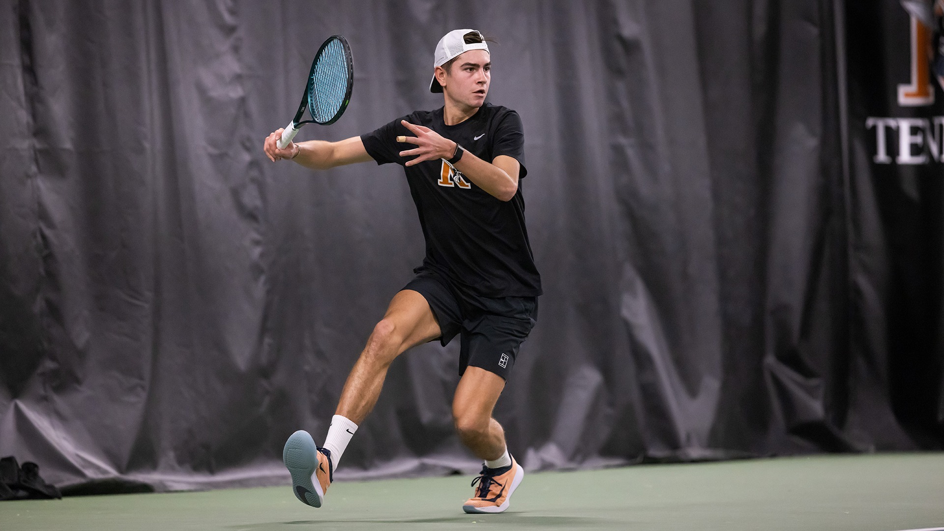 Alex Fleming playing tennis