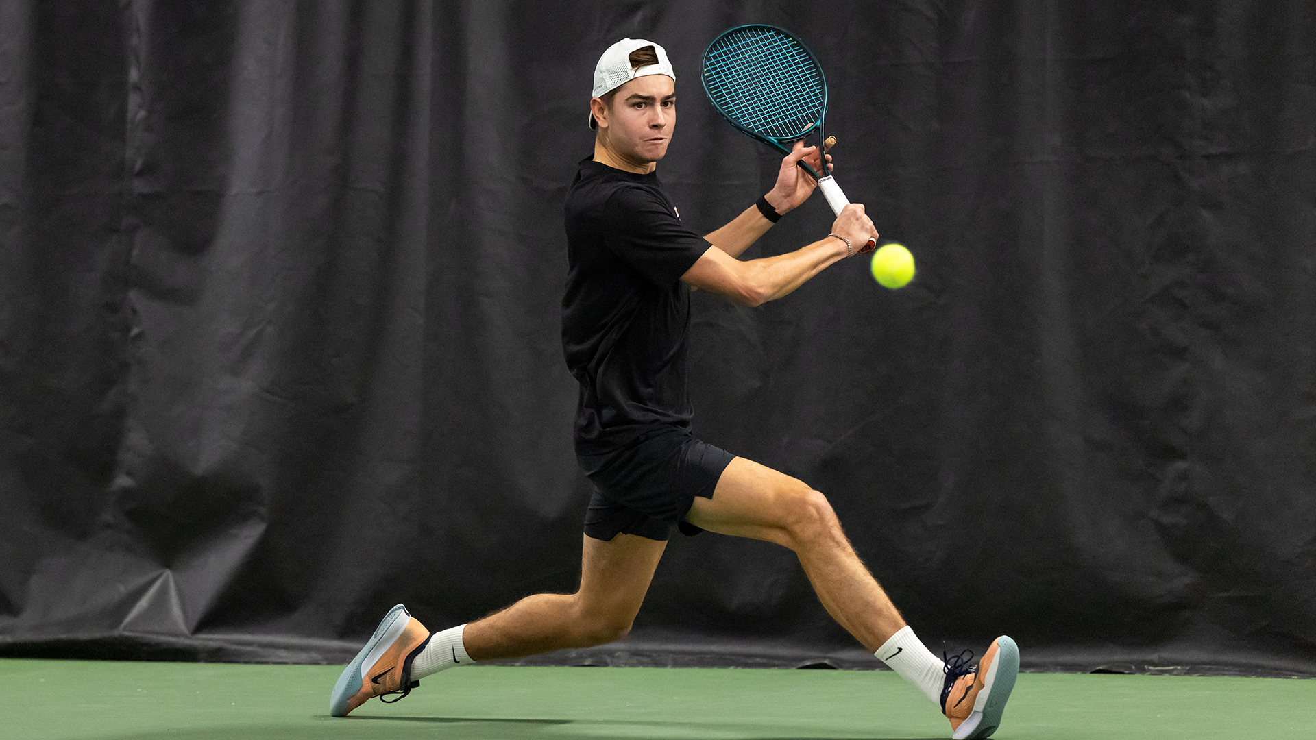 Alex Fleming playing tennis