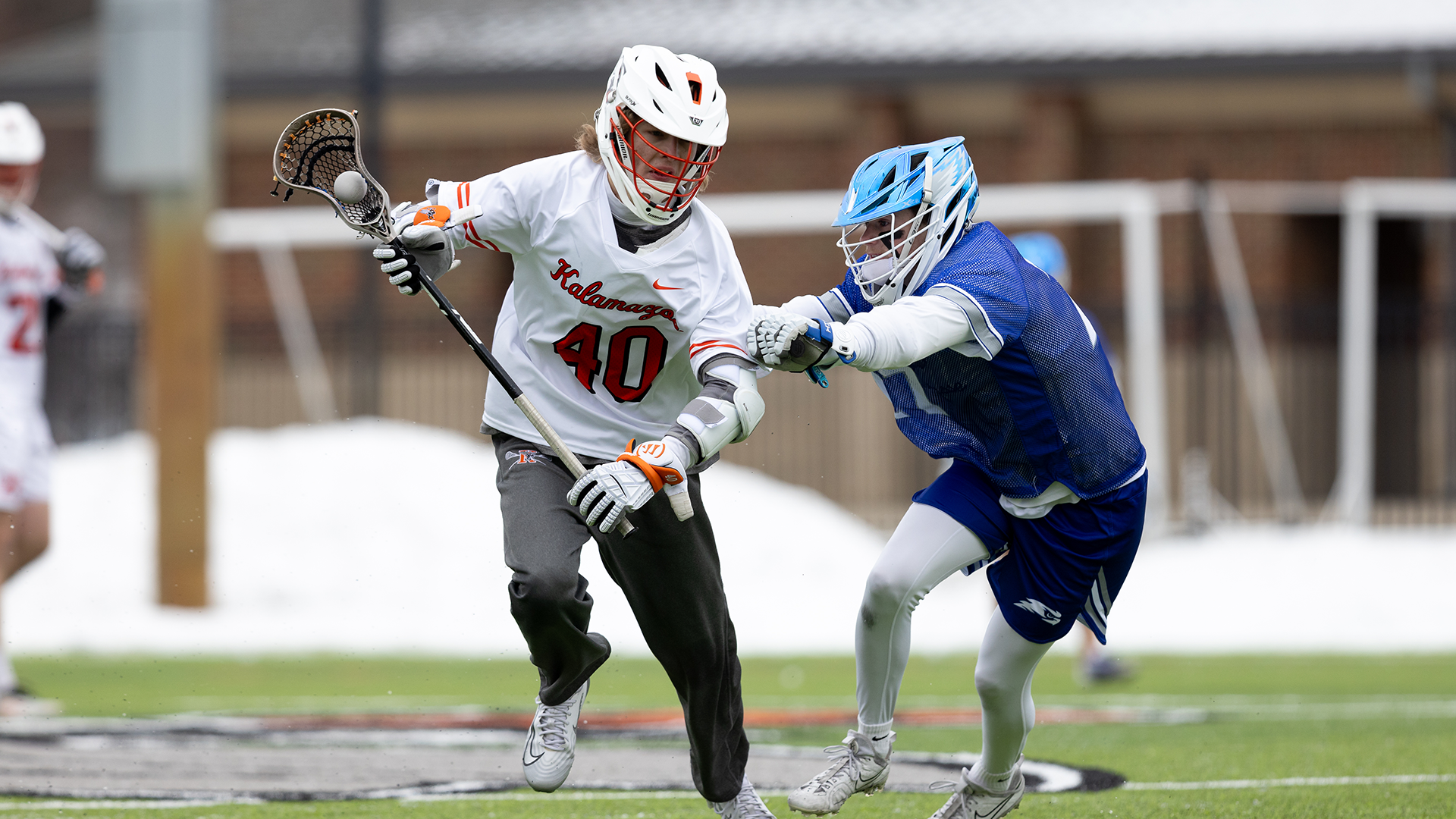 Luke Burzynski playing lacrosse