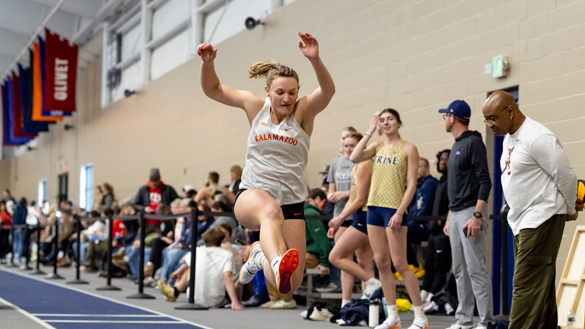 Rachel Meston competing in long jump