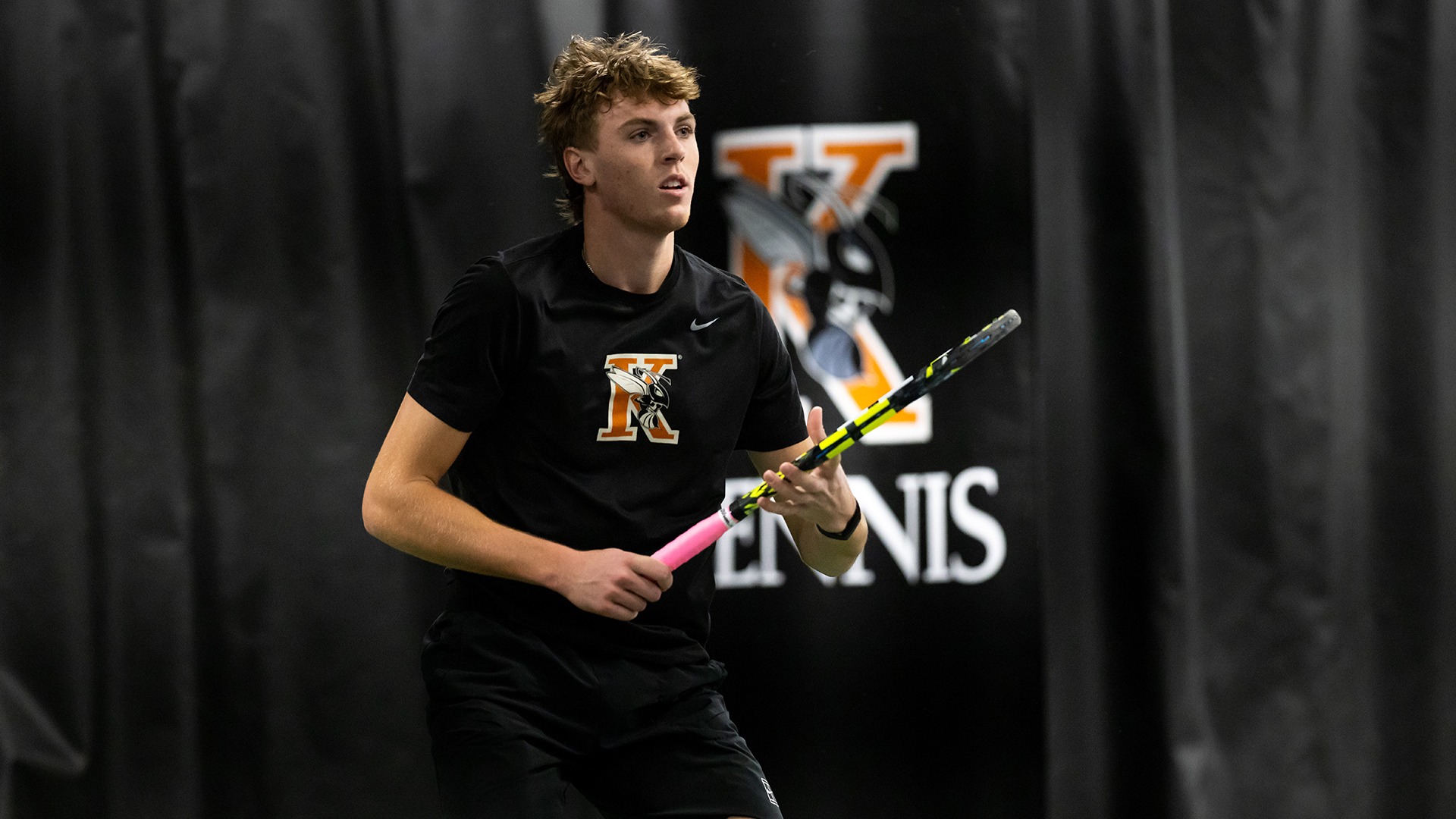 Cameron Crosby playing tennis