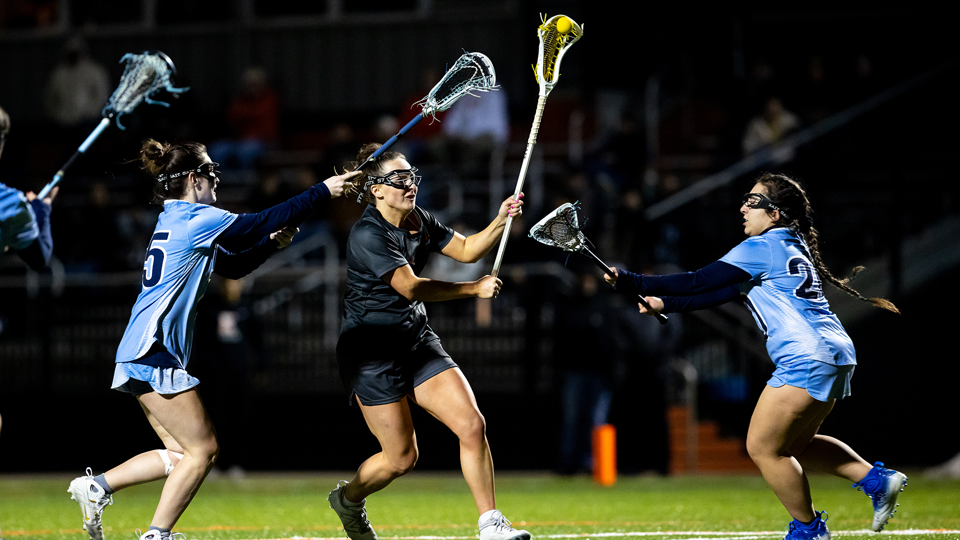 Ella Spooner playing lacrosse