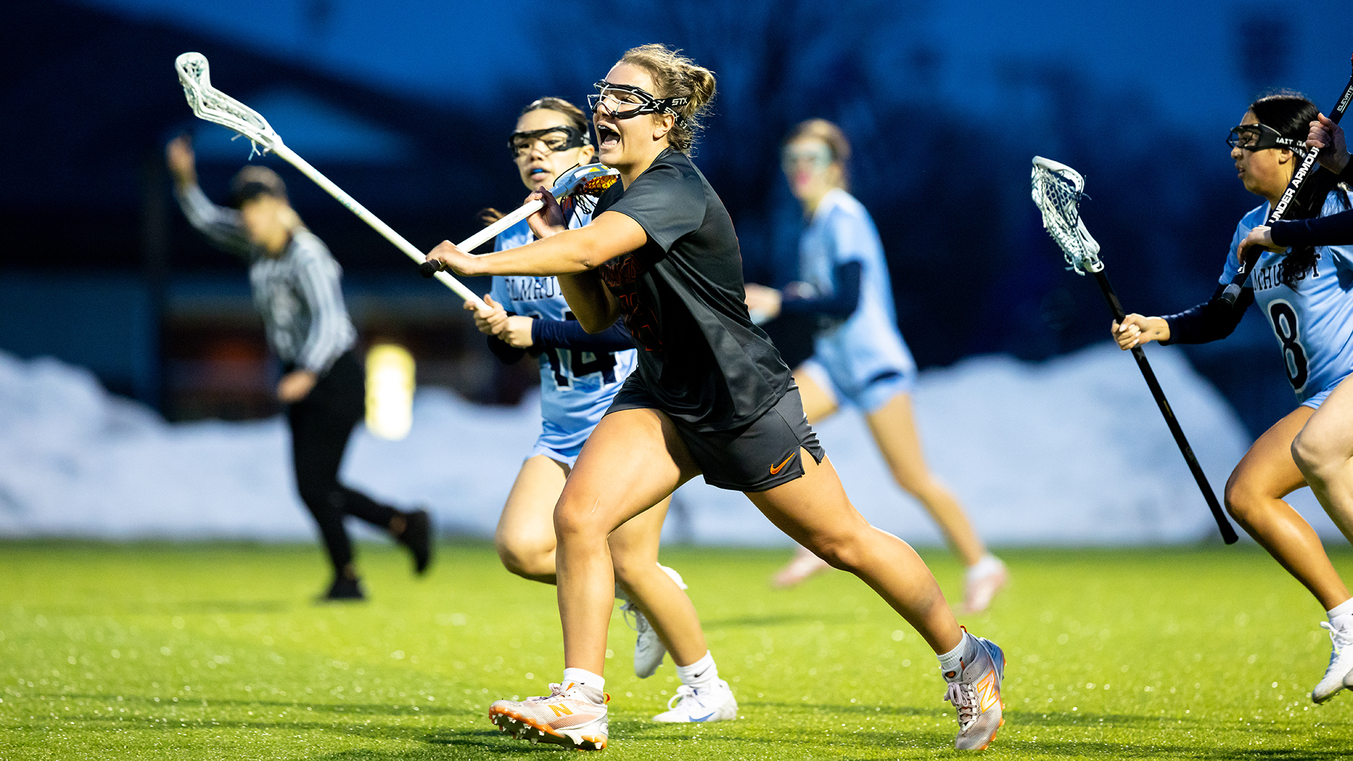 Kennedy Hynde playing lacrosse