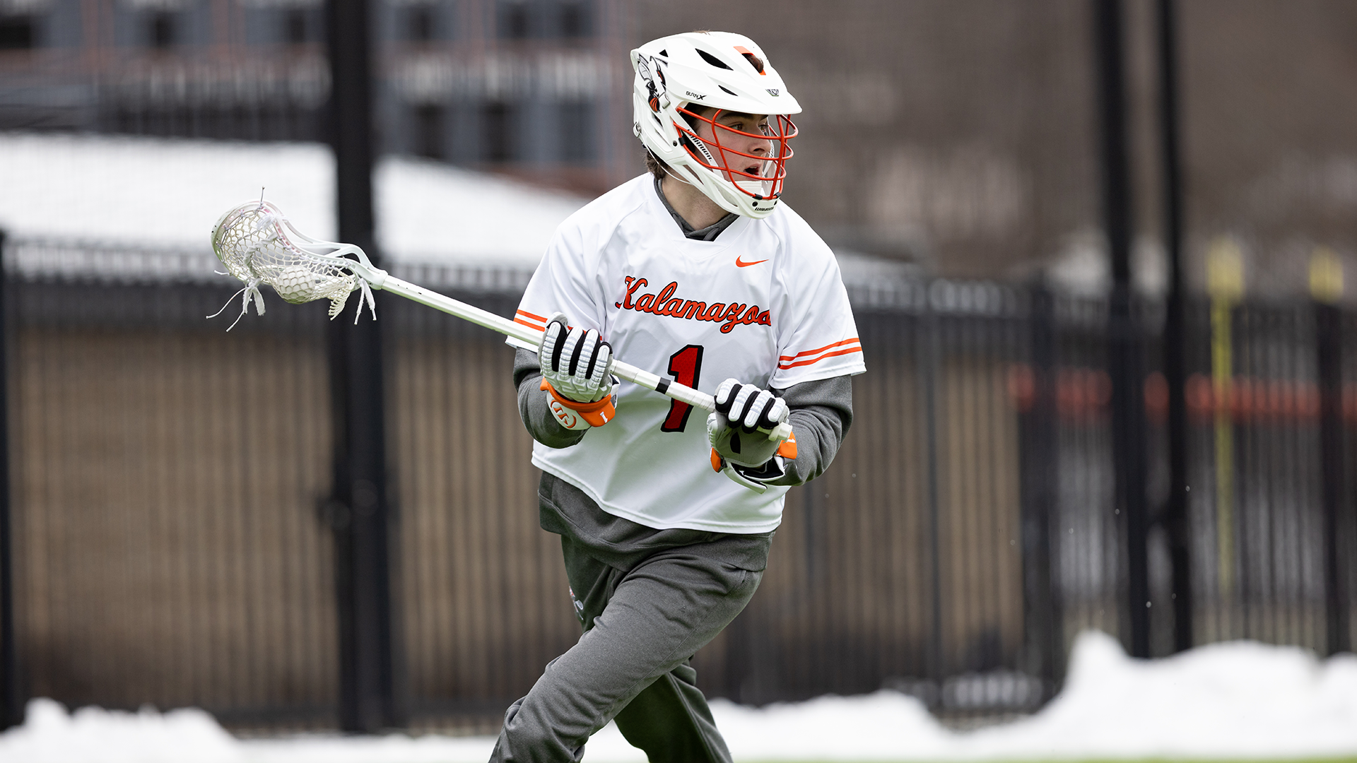 Tate Bless playing lacrosse