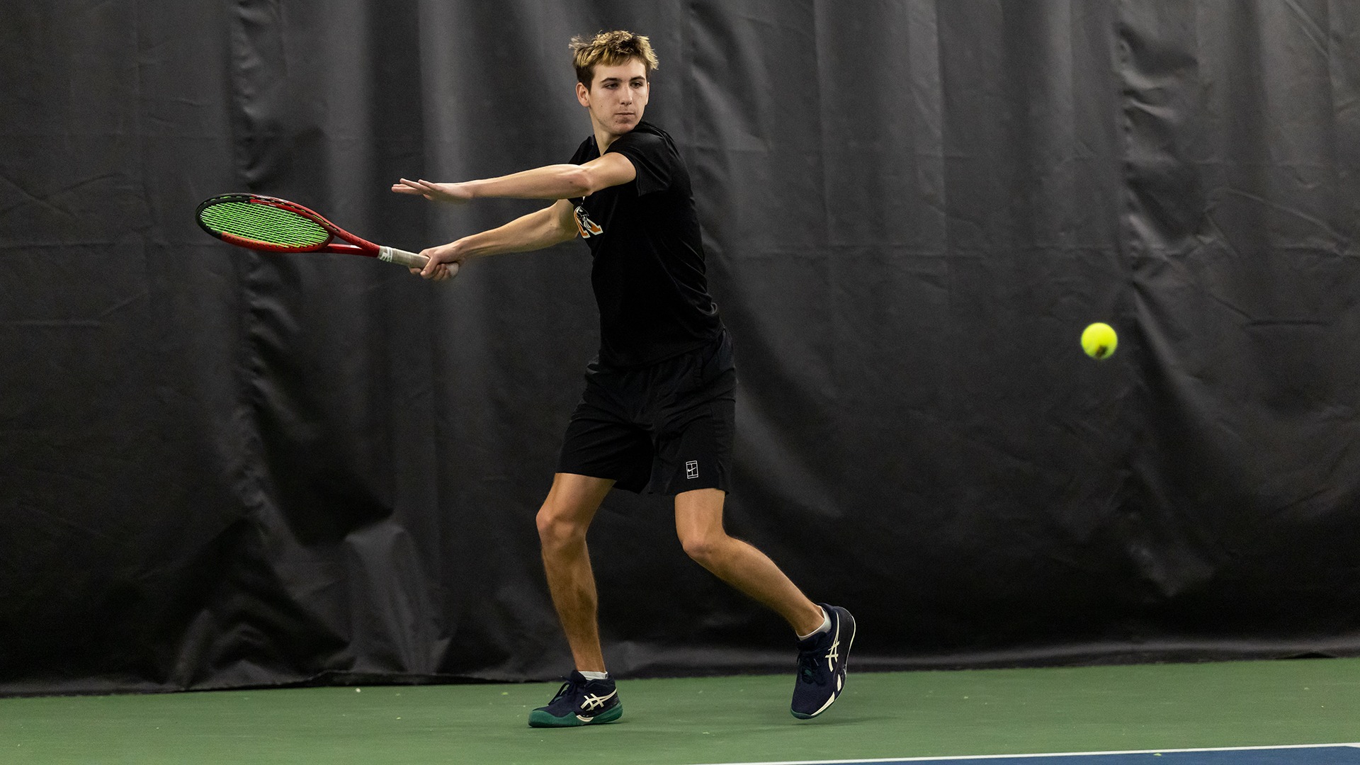Derek Blackwell playing tennis