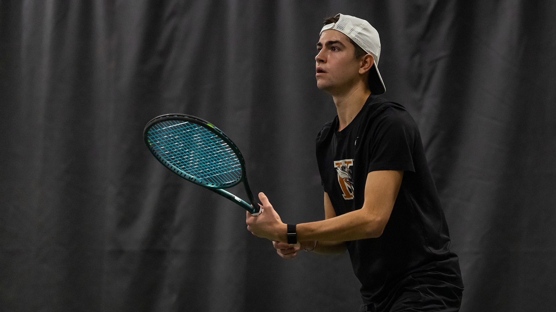 Alex Fleming playing tennis