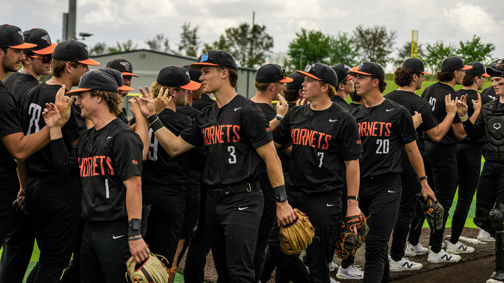 The Kalamazoo College baseball team celebrating a win