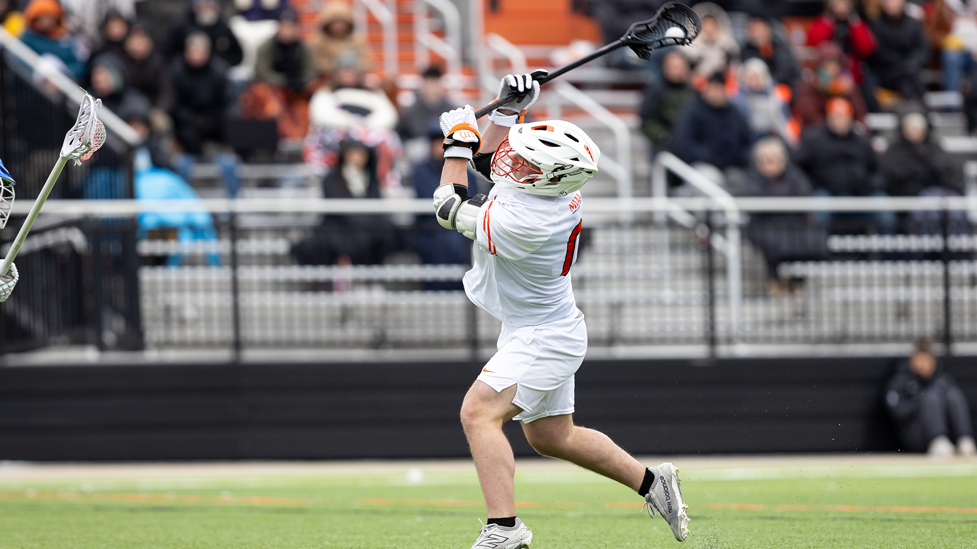 Max Plesscher playing lacrosse