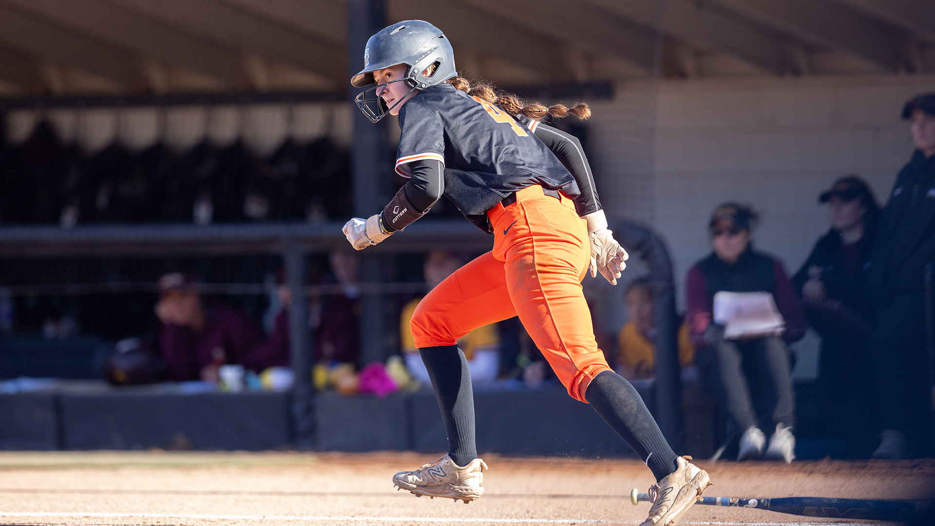 Macy Ward playing softball