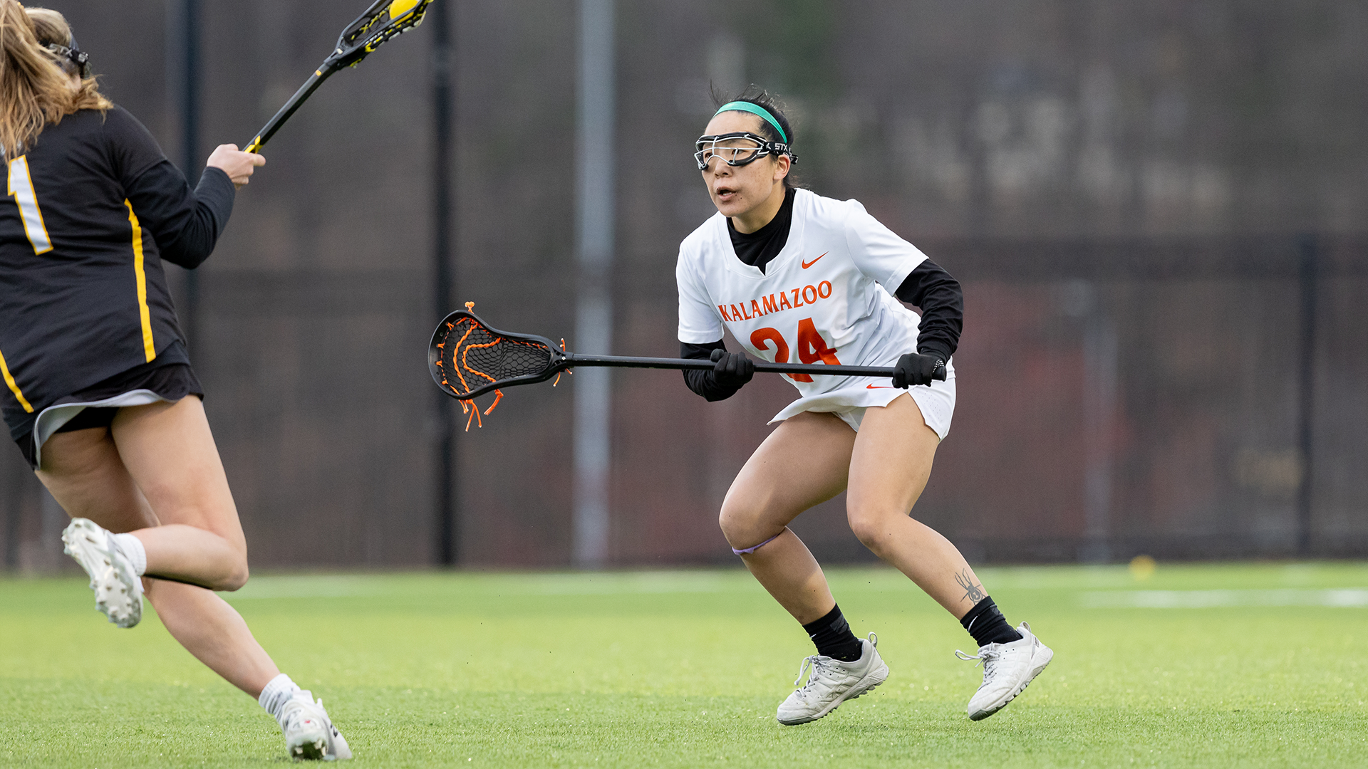 Annslee Ware playing lacrosse