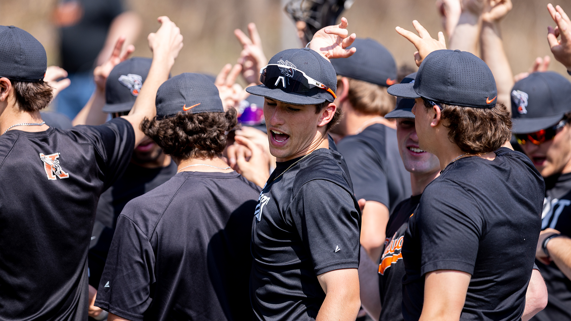 The Kalamazoo College baseball team huddled up before a game