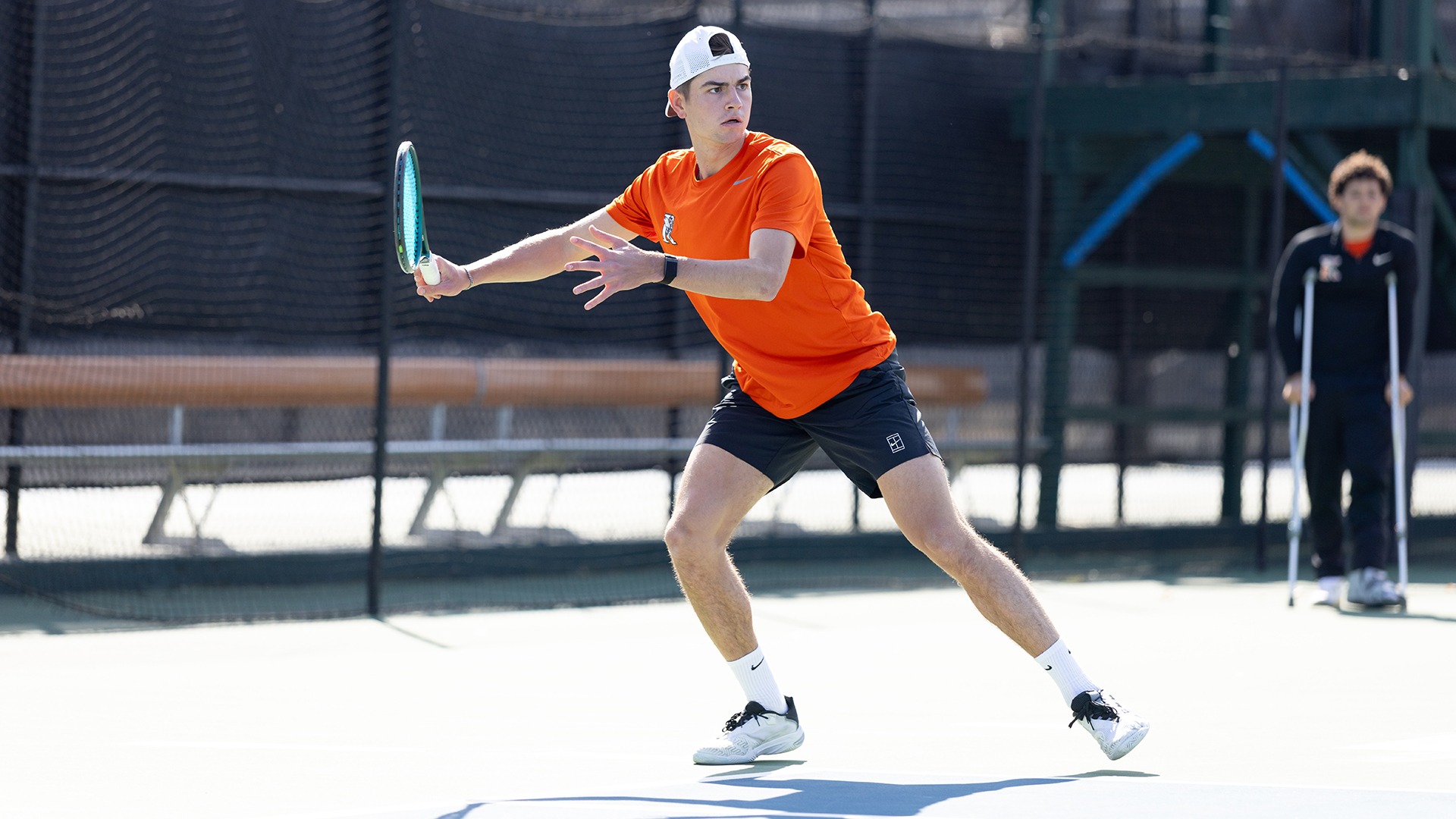 Alex Fleming playing tennis