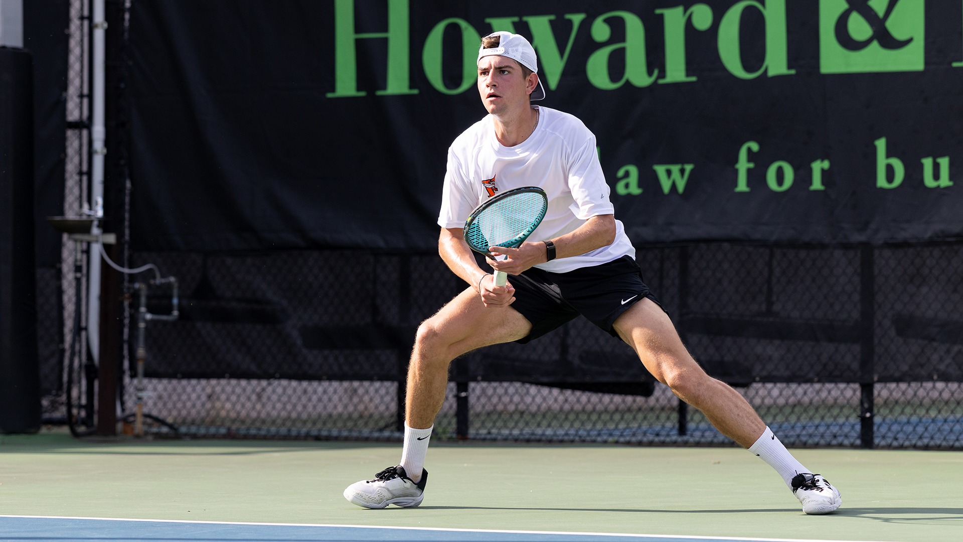 Alex Fleming playing tennis