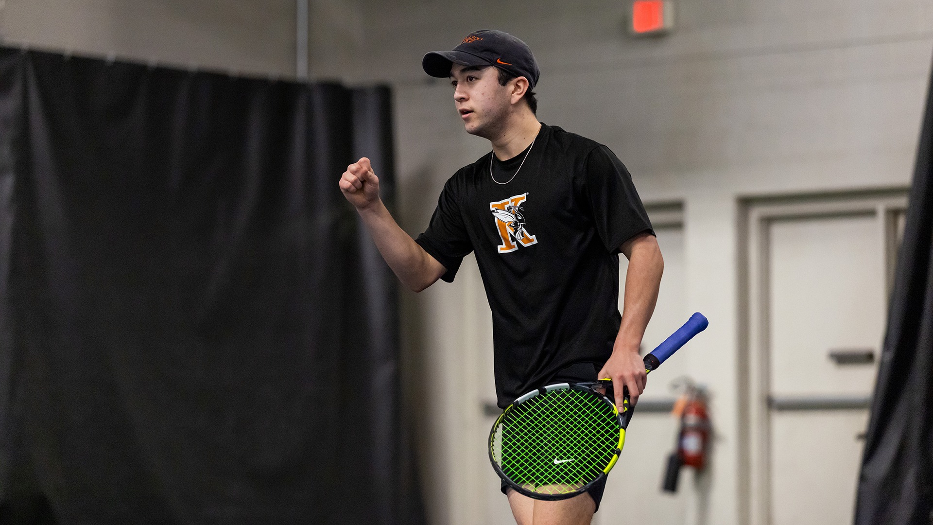 Will Seymour celebrating a point in men's tennis