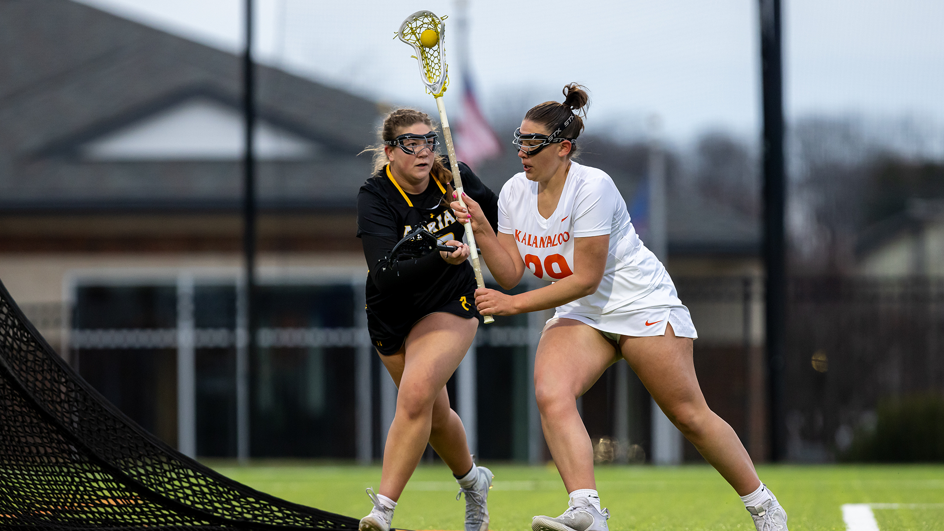 Abbie Caza playing lacrosse