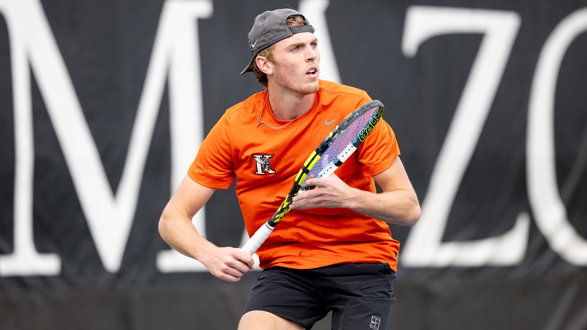 Cameron Crosby playing tennis