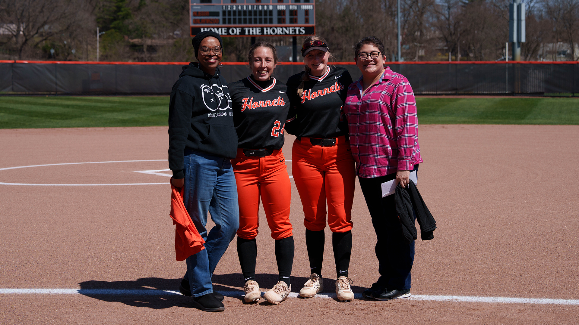 The Kalamazoo College softball 2025-26 seniors and their MVPs on the Kalamazoo College Softball Field