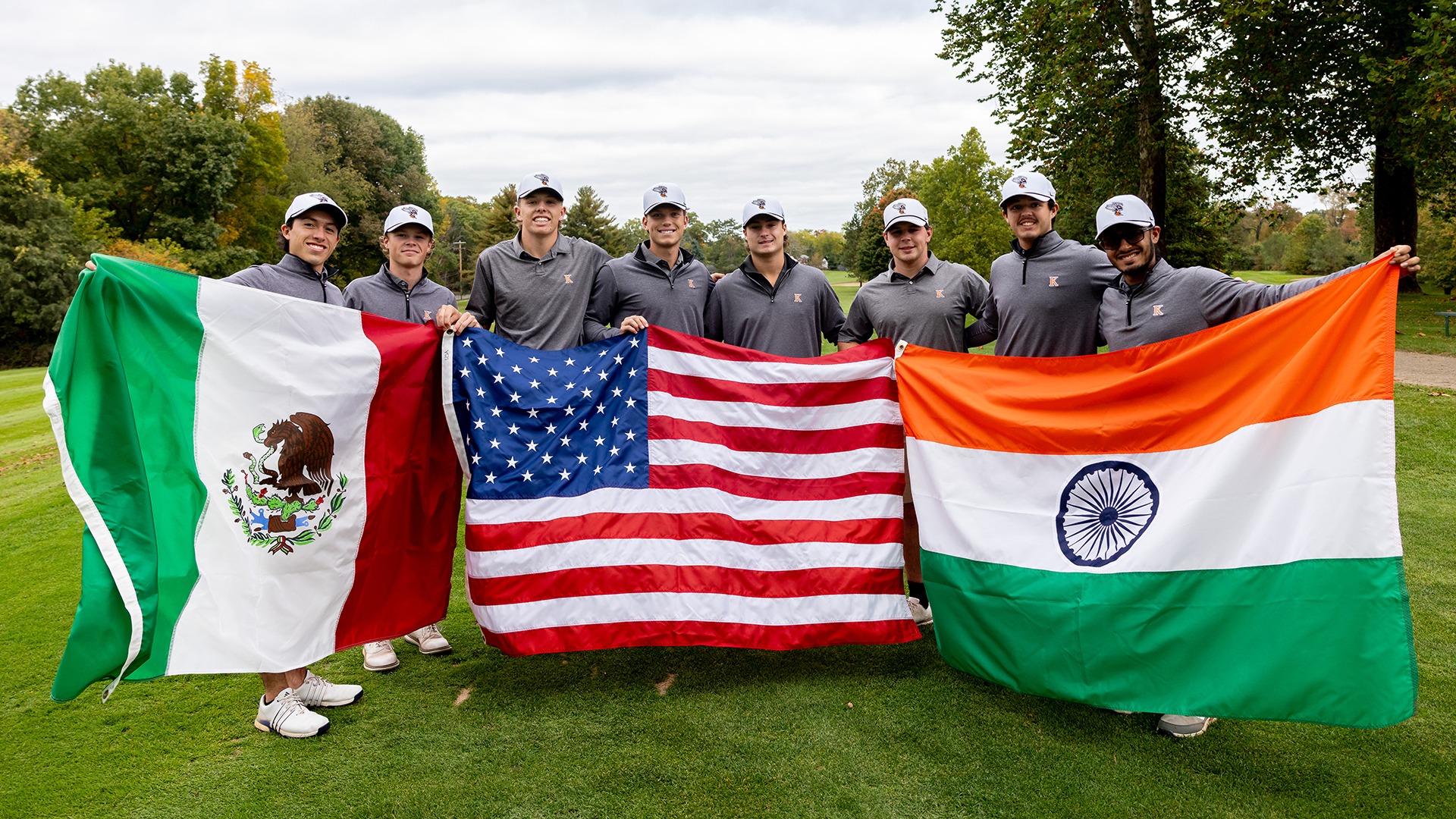 Men's Golf Team with national flags 