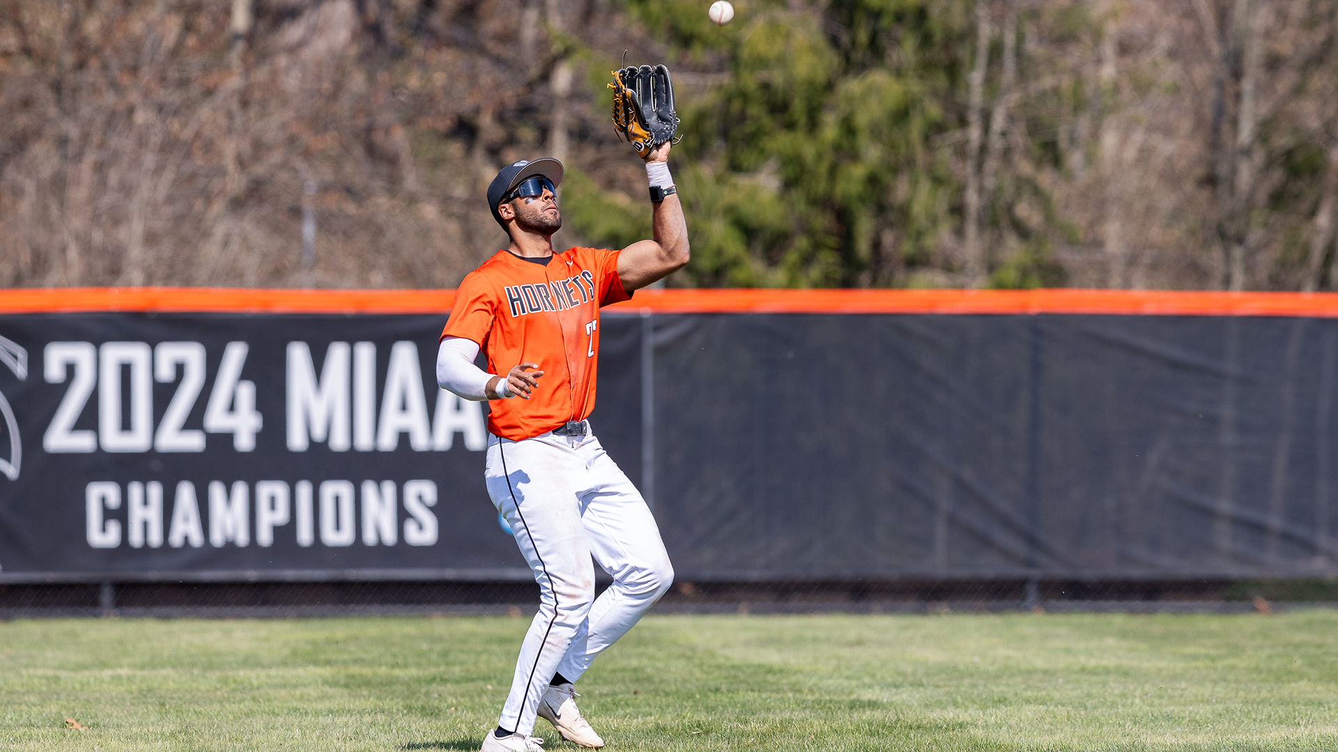 Robert Newland playing baseball