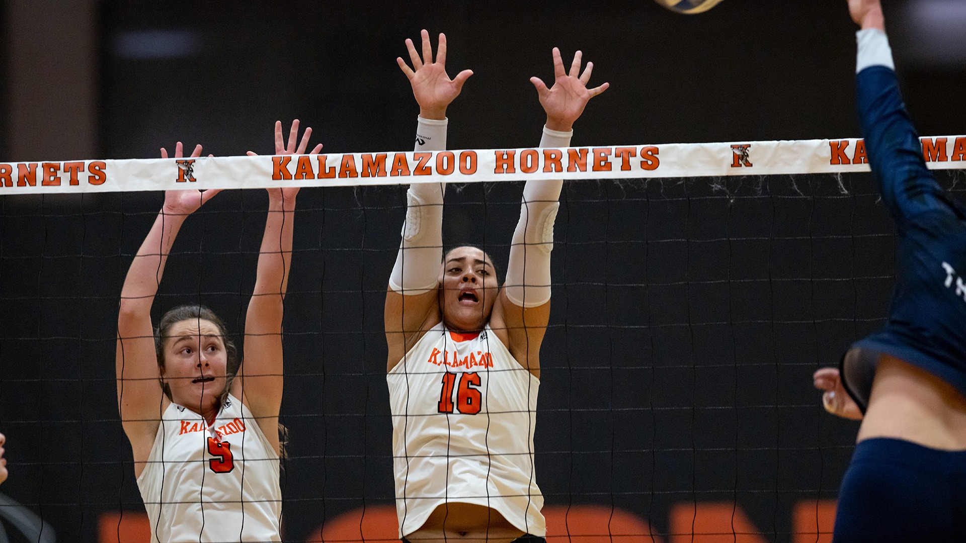 Savannah Chapie and Taylor Stephens playing volleyball