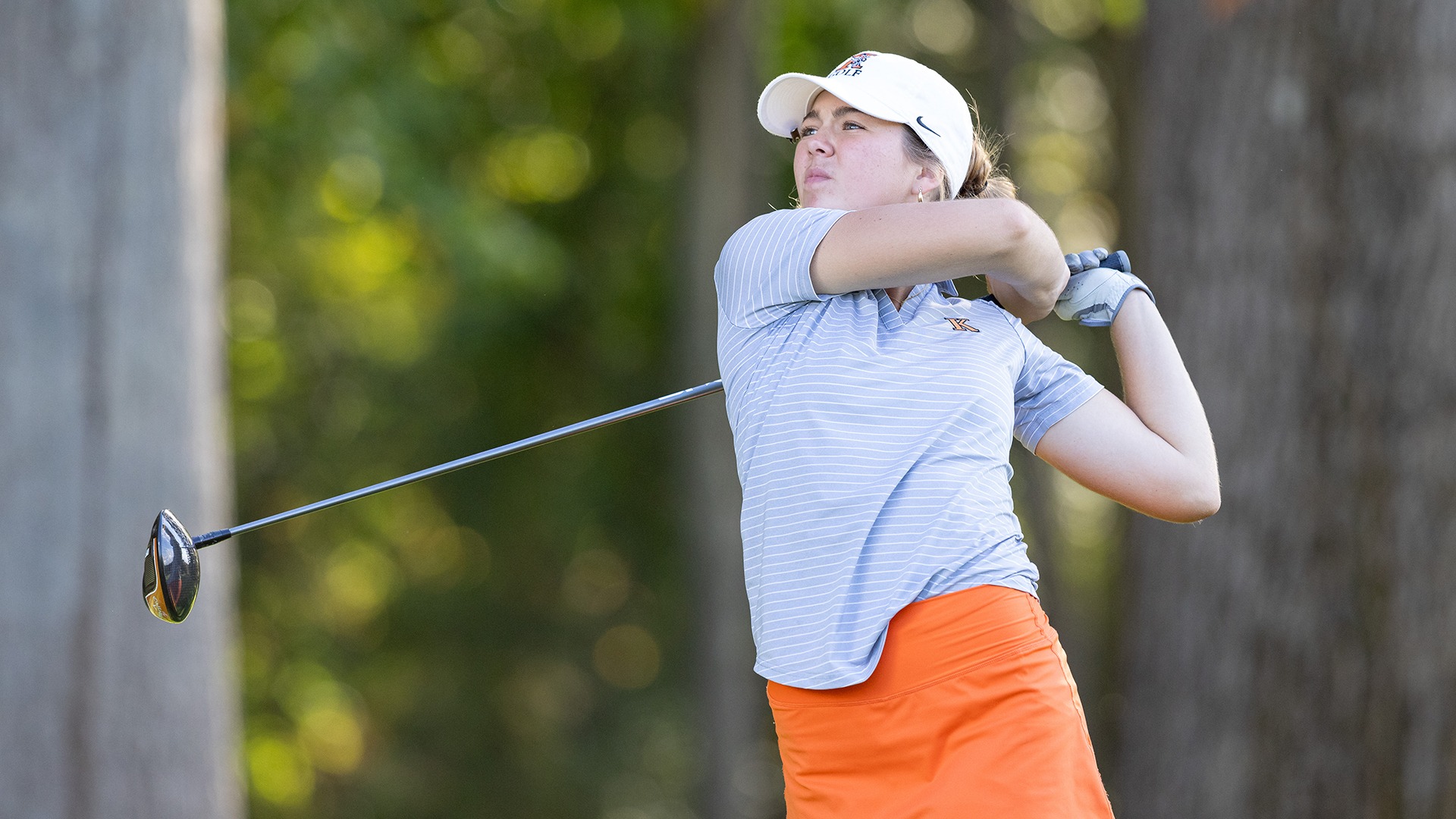 Jacey Merkle playing golf