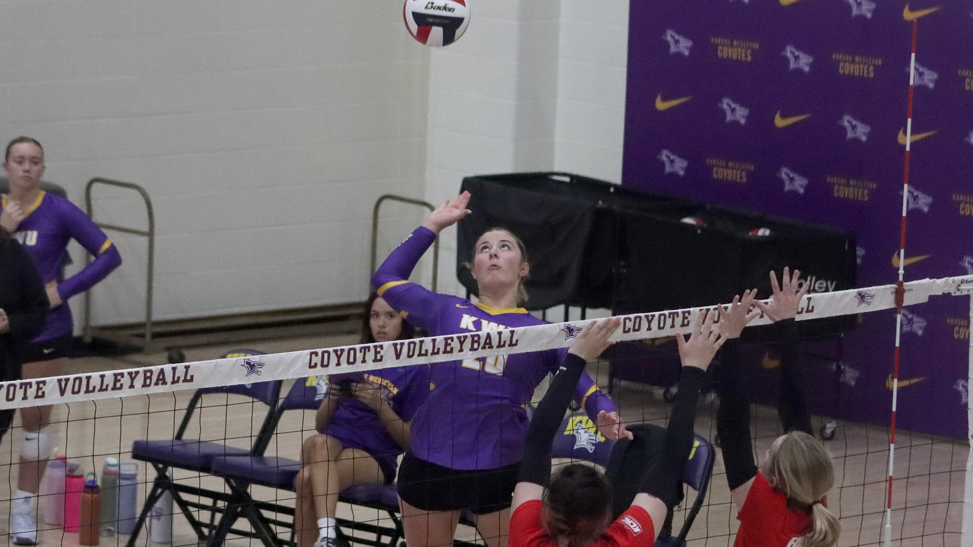 women's volleyball action from September 20