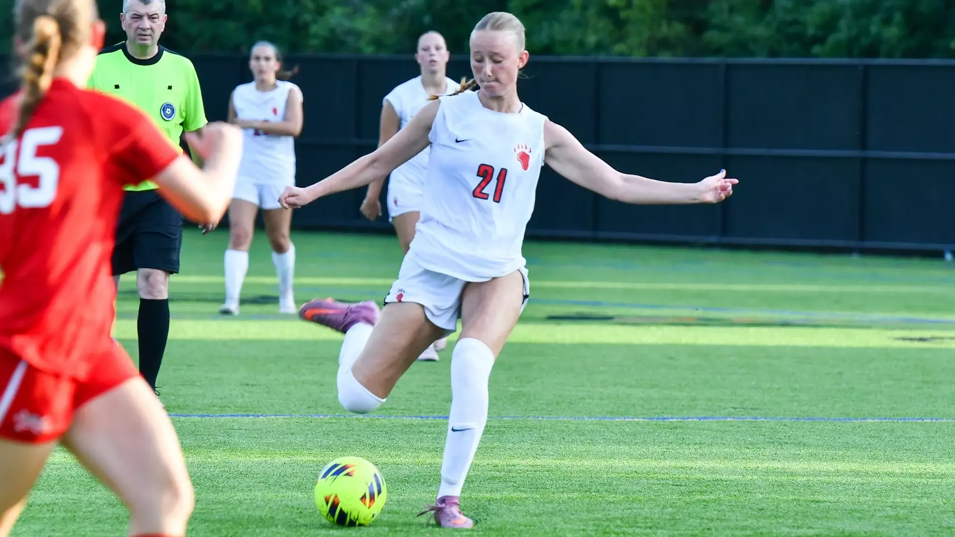 Maggie Balas kicks the ball forward in a match against MSOE
