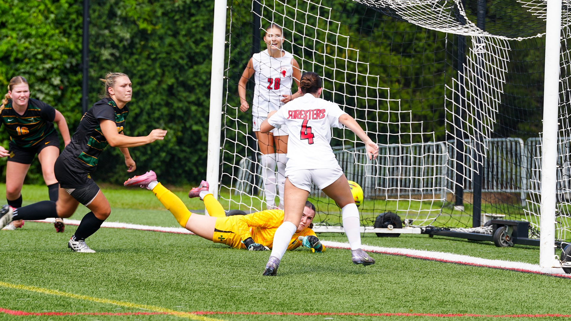Sophia Key scores against St. Norbert College