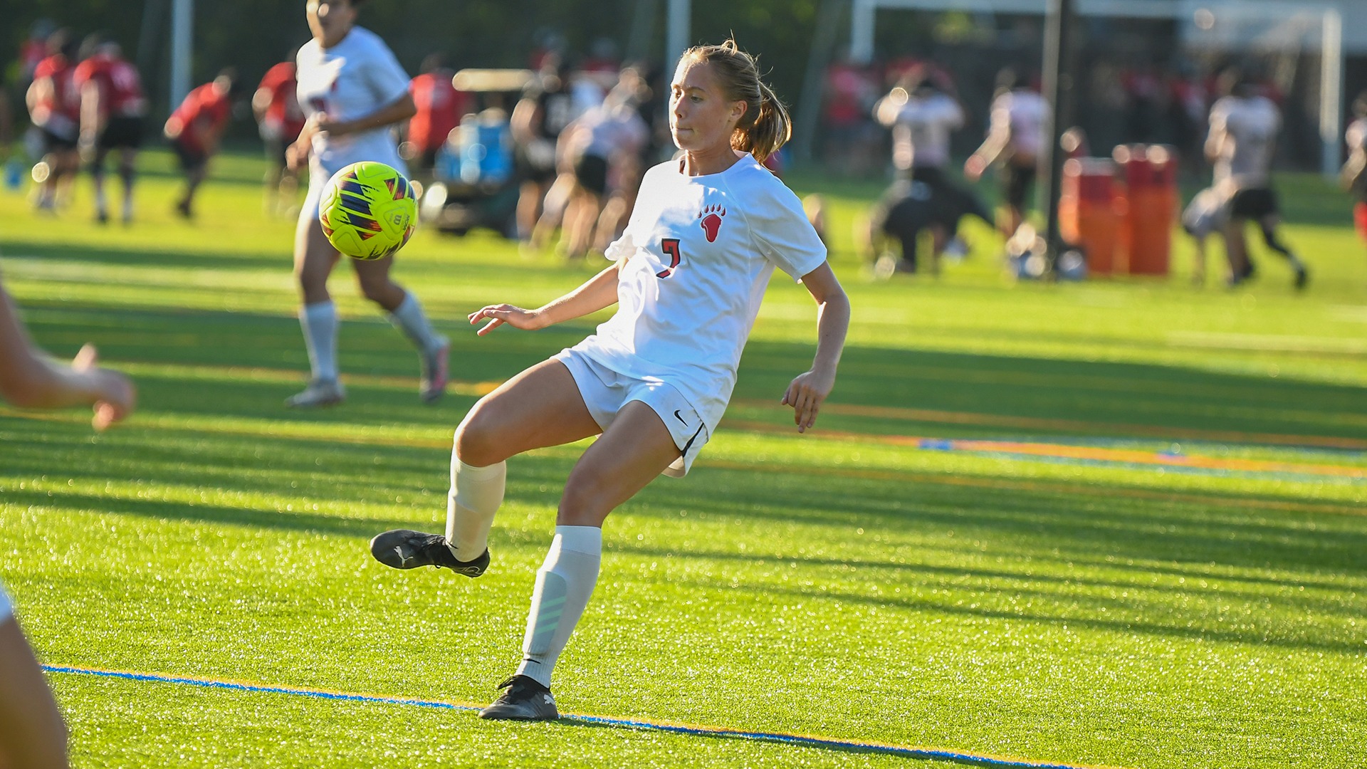 Ella Lubarsky kicks a ball