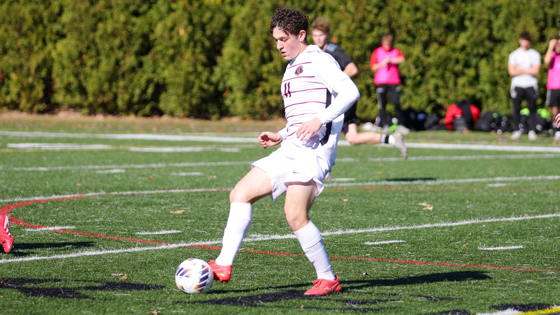 Nathan Kostovetsky kicks a ball