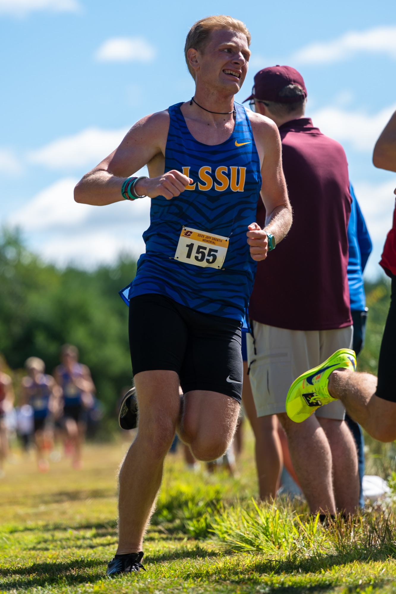 LSSU's Alex Tyndall races at the 2025 Jeff Drenth Memorial 5K. He finished with the best 5K time ever by an LSSU freshman. Photo credit to Kailey Hill, CMUChippewas.com.