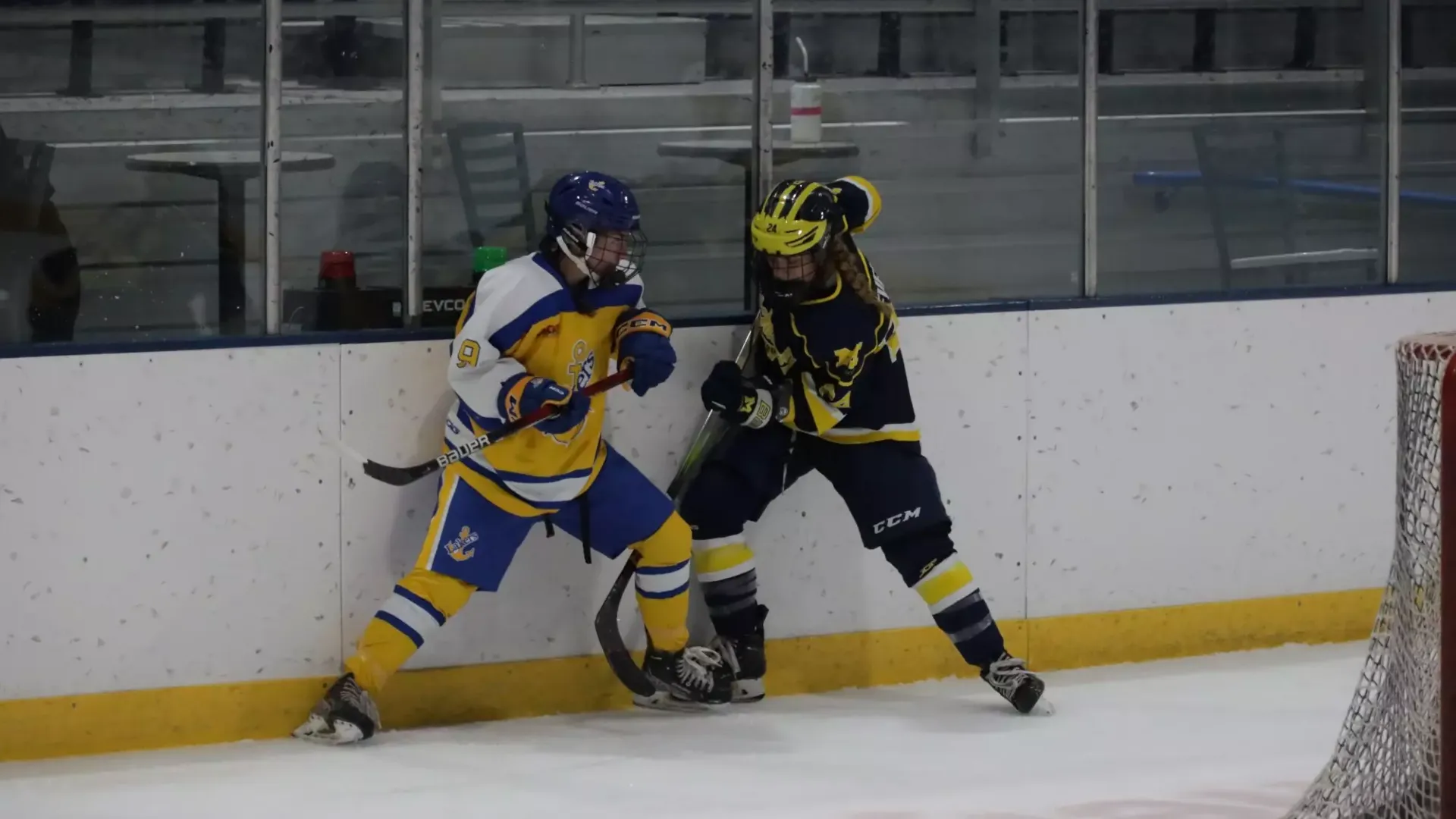 Chloe Boyko fights for the puck in her skates