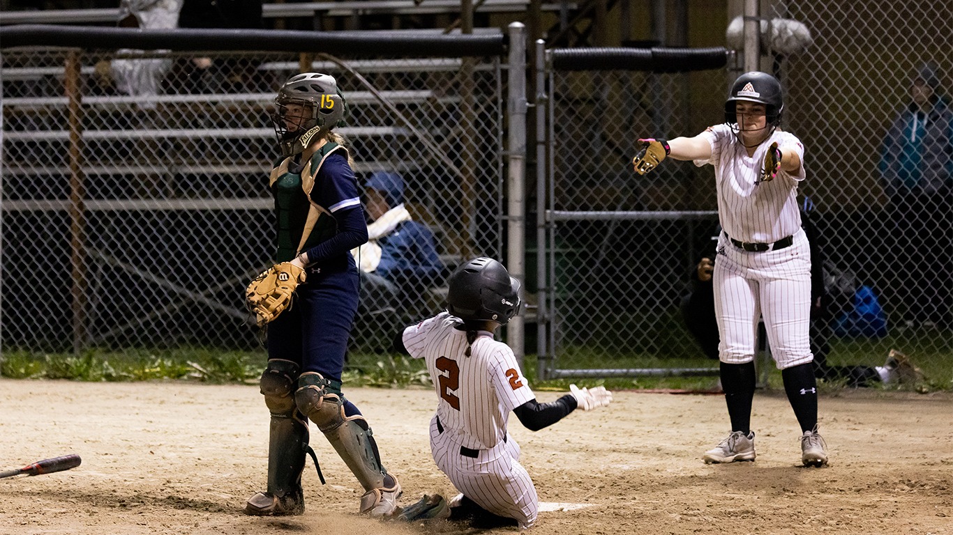 Renelle Bourque slides home