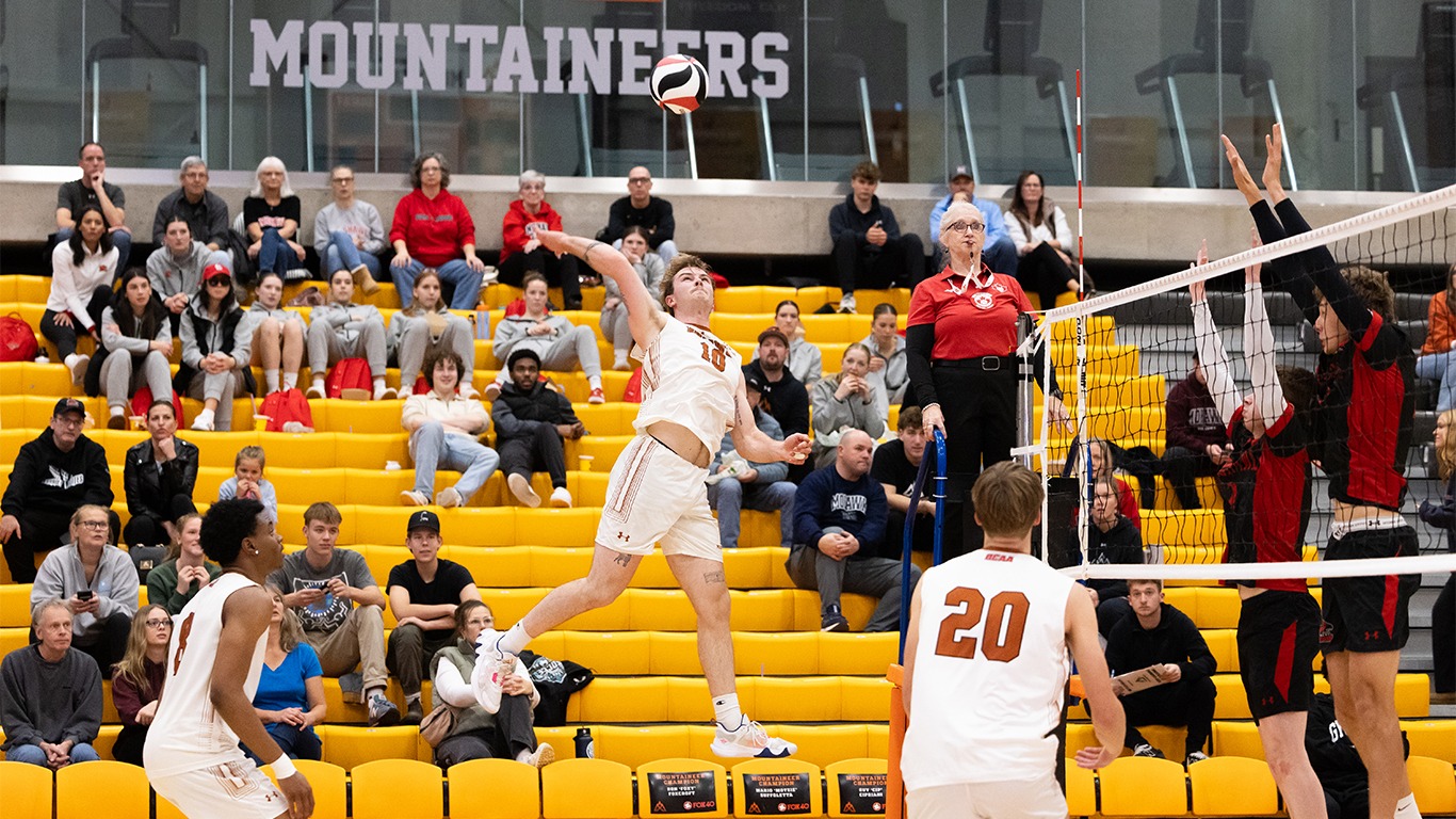 Dean Zicari goes up for the smash