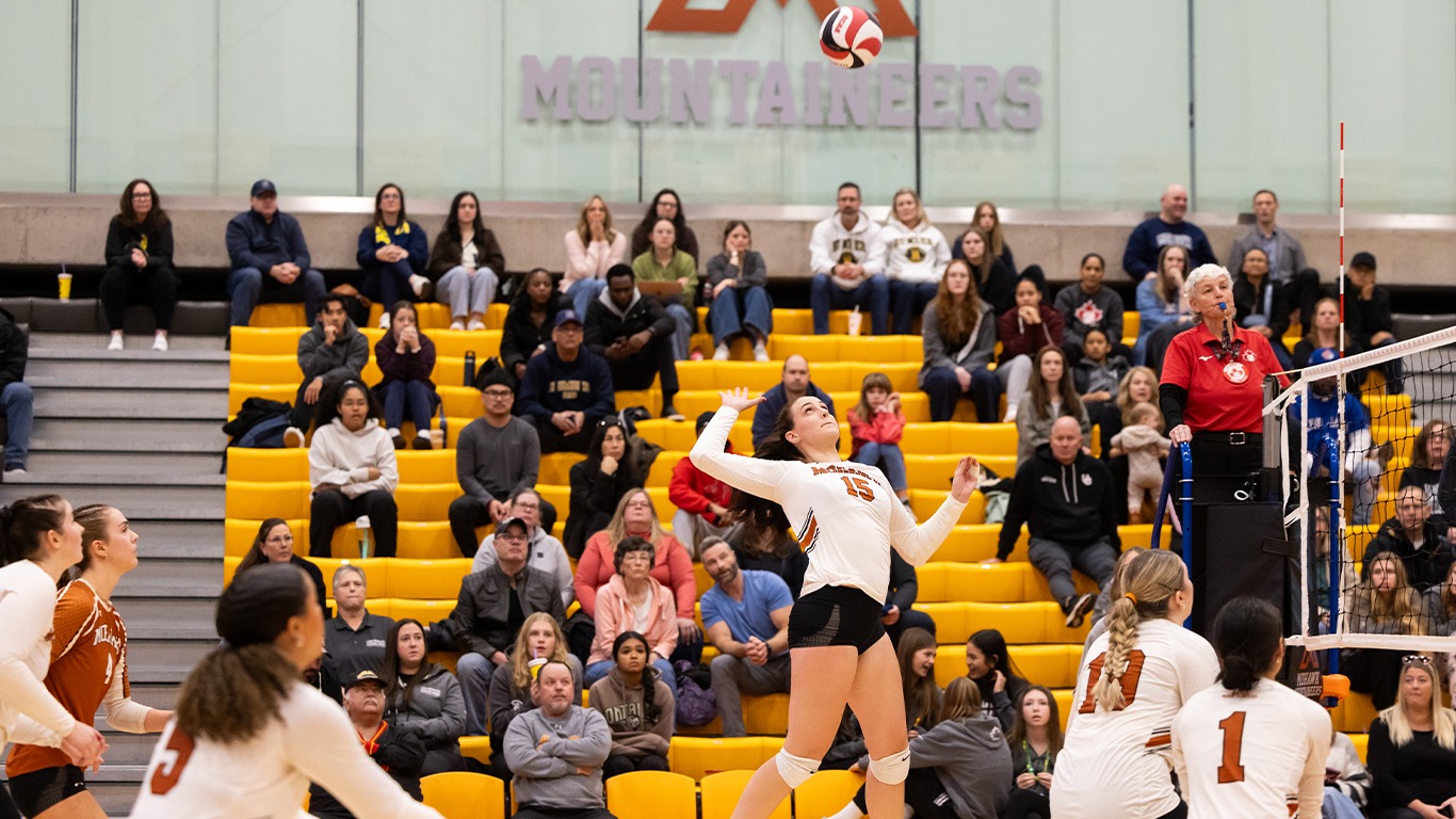 Avery McConkey goes up for the swing