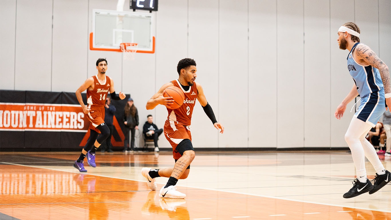 Dante Richards races the ball up the floor