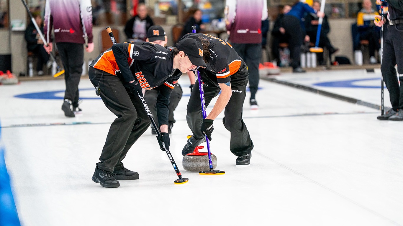 Men's curling sweeping