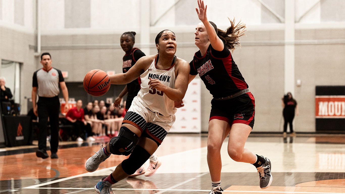 Kendra Oliver attacking Fanshawe on offense