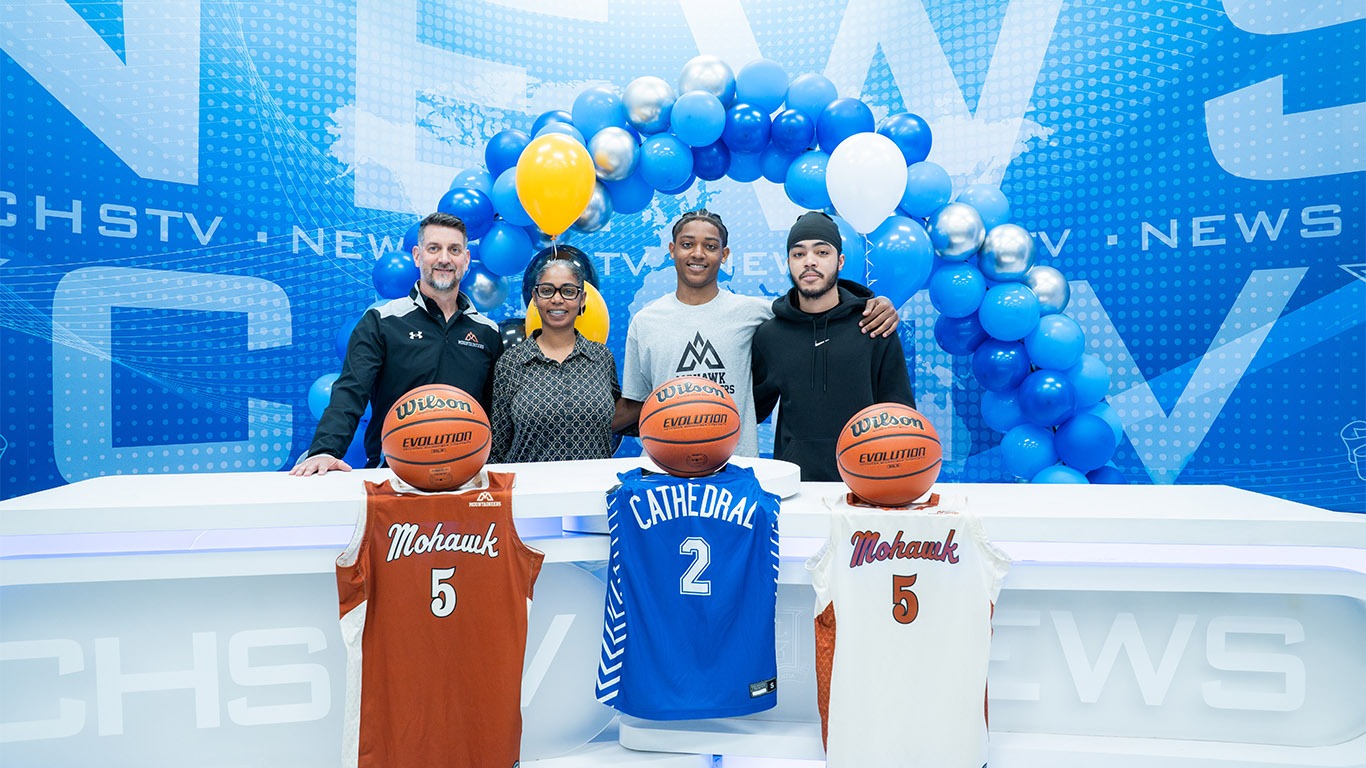 Joshua Granger with family and head coach Jamie Girolametto