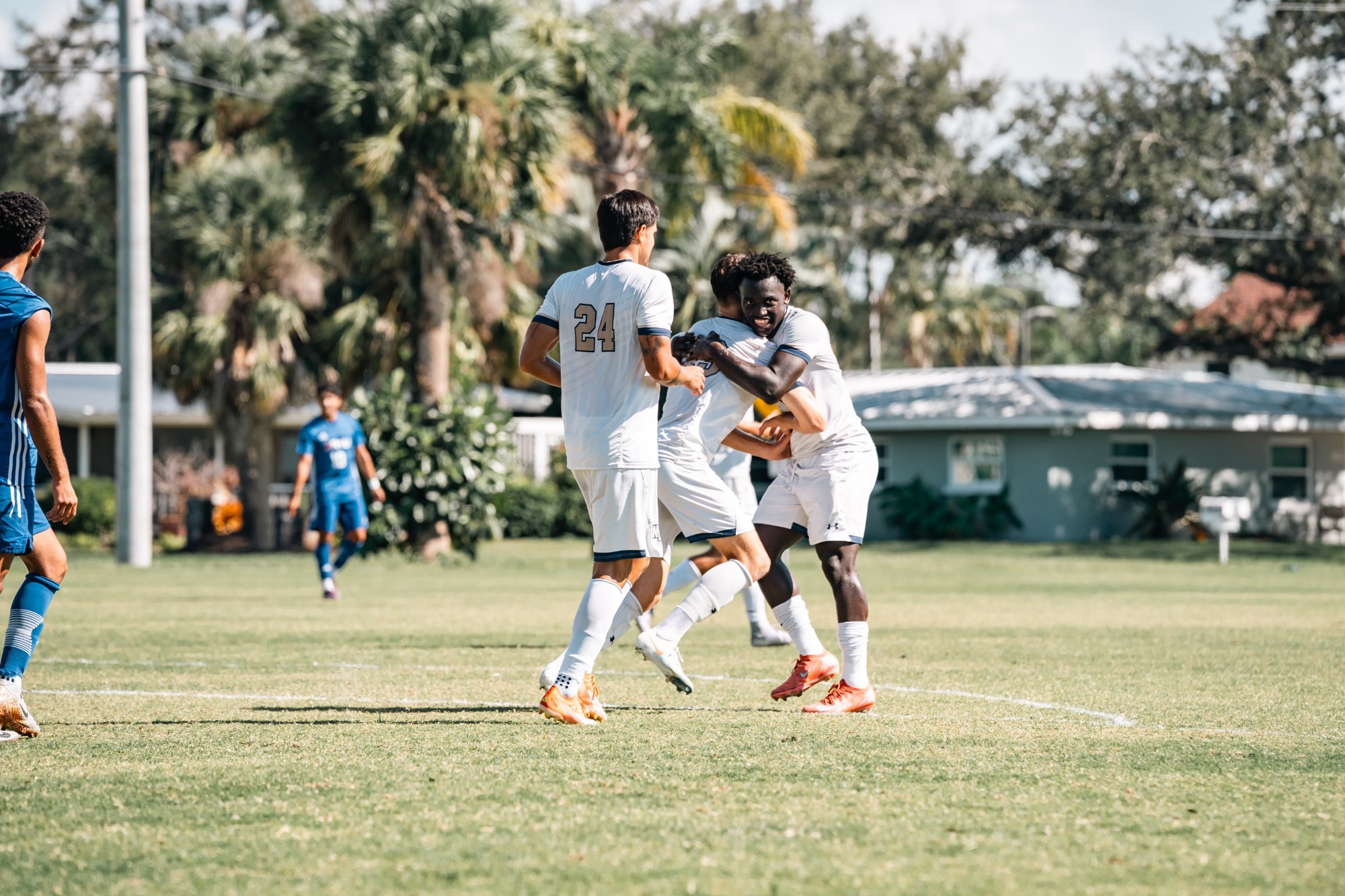 The Mighty Banyans celebrate a goal on Senior Day vs. Florida Memorial.