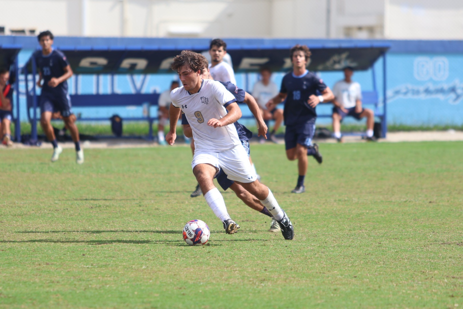 Martin Pascual in action during New College of Florida's Sun Conference Semifinal match at Keiser.