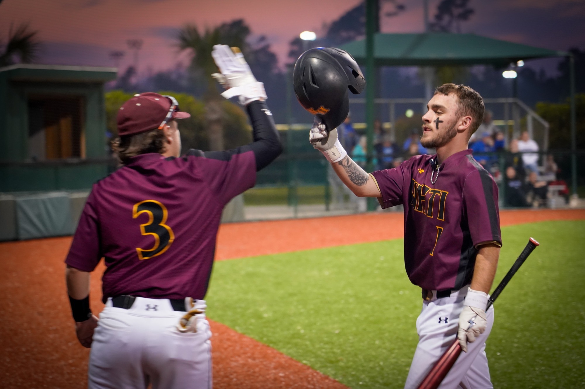 Richie Thibeault and Matthew Waszeciak celebrate a run scored.